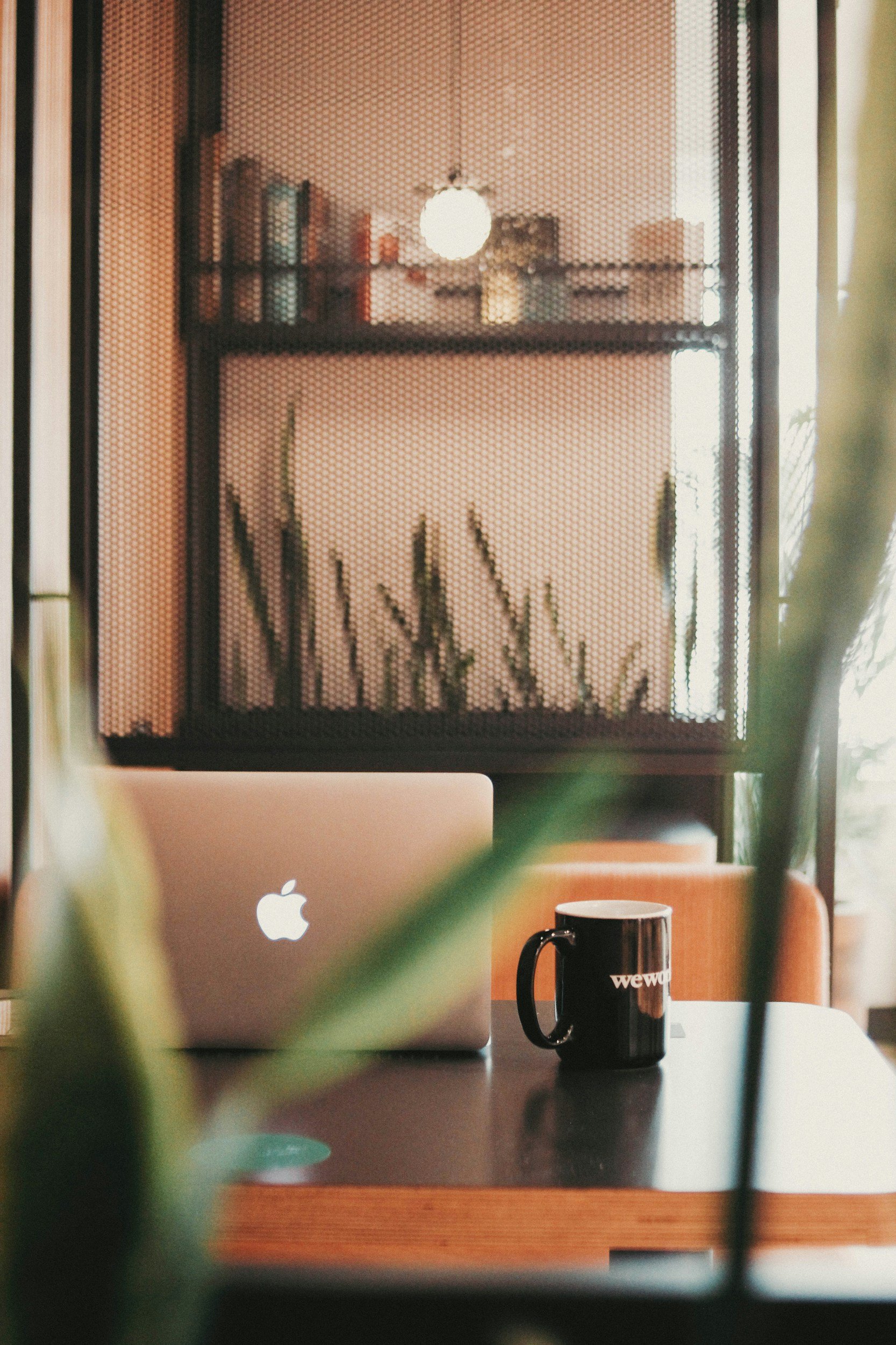Modern workspace with laptop and coffee